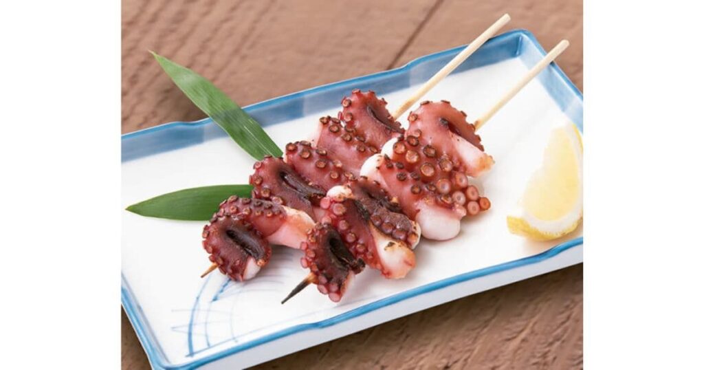 謝記巨大章魚脚 タコ炭火串焼き